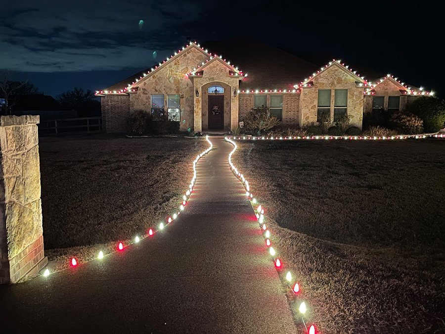Lights lining driveways, sidewalks, and paths